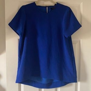 Madewell royal blue short-sleeve viscose top with yoked back and high-low hems